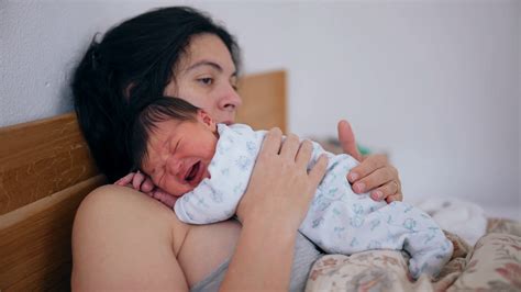 Mother Holding Newborn Close To Chest Stock Footage SBV-349204304 ...